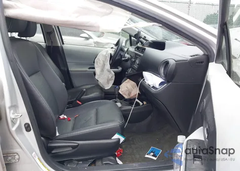 2014 Toyota Prius C Four from USA, damaged, VIN JTDKDTB34E1078028